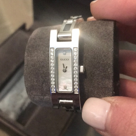 Authentic Gucci diamond and mother of pearl watch